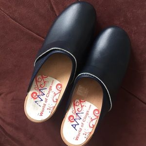 Worn once navy blue wooden clogs